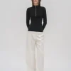 RIBBED ZIP UP TURTLENECK SWEATER