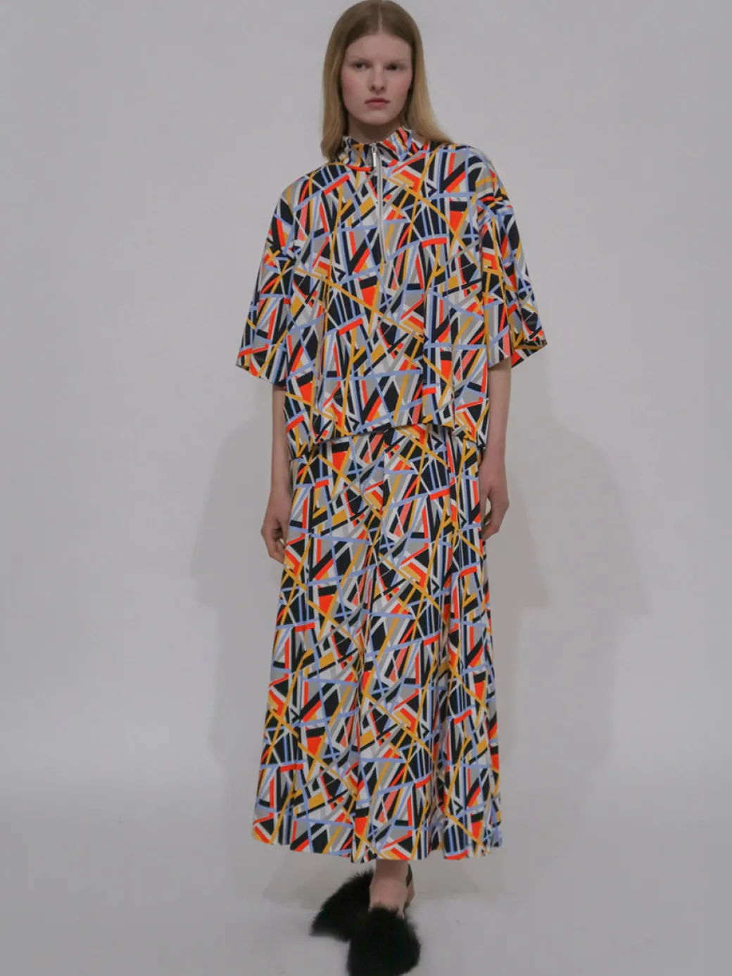 ZIP-UP OVERSIZED POLO TOP - ABSTRACT
