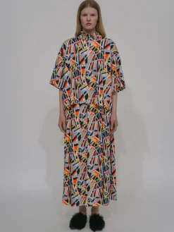 ZIP-UP OVERSIZED POLO TOP - ABSTRACT
