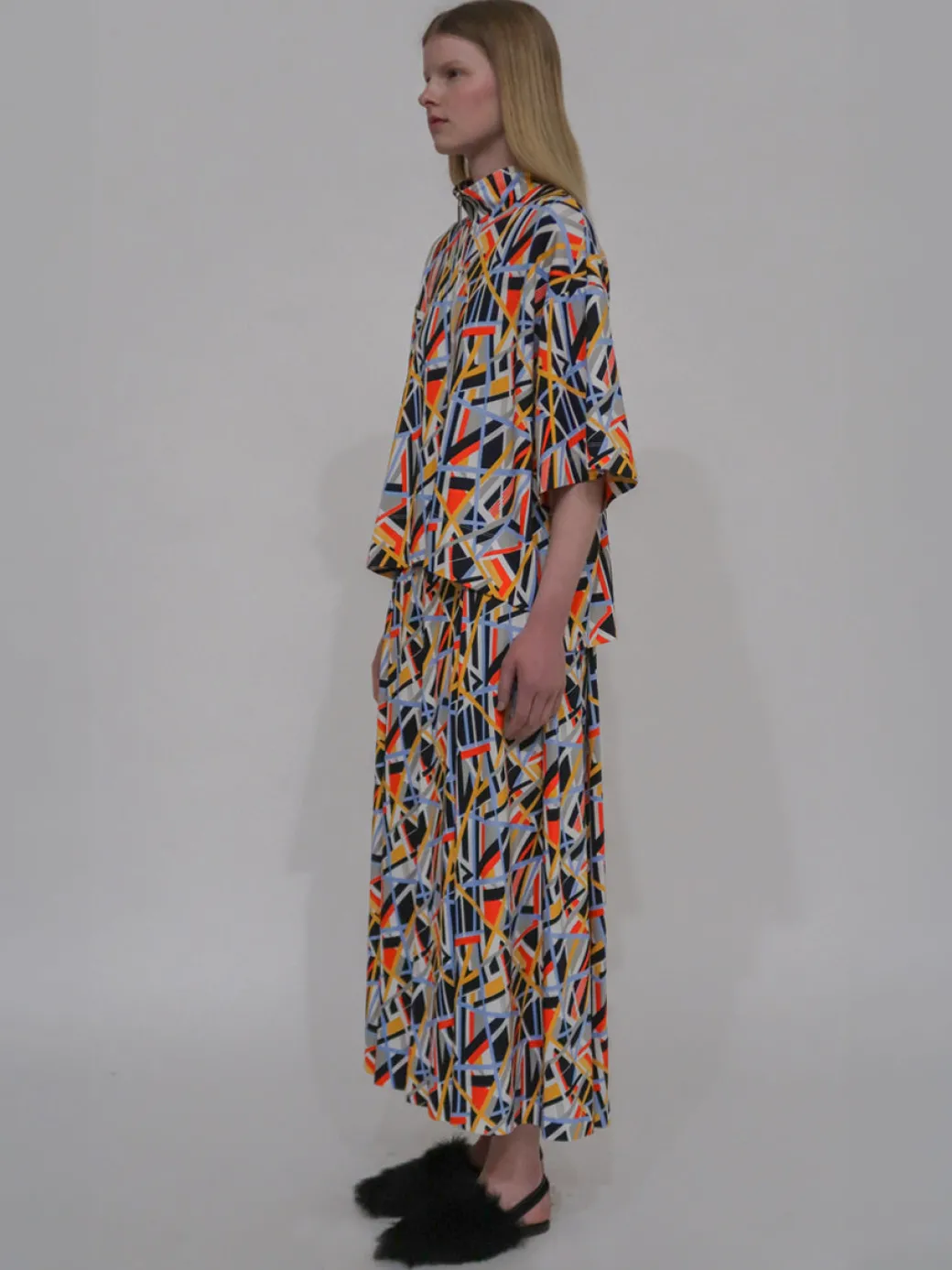 ZIP-UP OVERSIZED POLO TOP - ABSTRACT