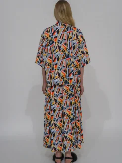 ZIP-UP OVERSIZED POLO TOP - ABSTRACT